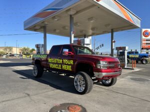 Red DMV Made Easy Truck in parking lot